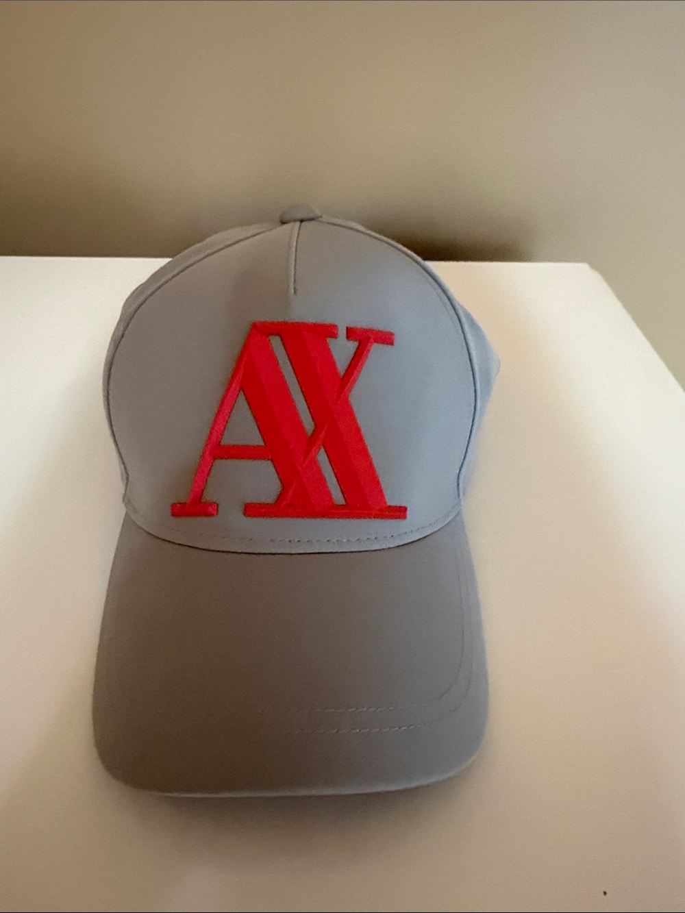 Armani Exchange Gray Cap with Red AX Emblem